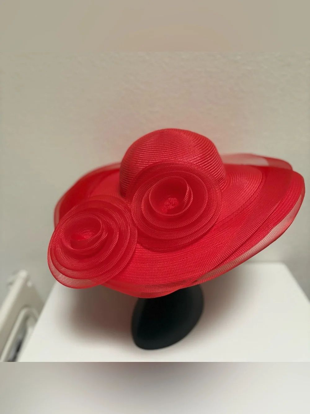 Elegant Red Wide-Brim Dress Hat with Decorative Rosette